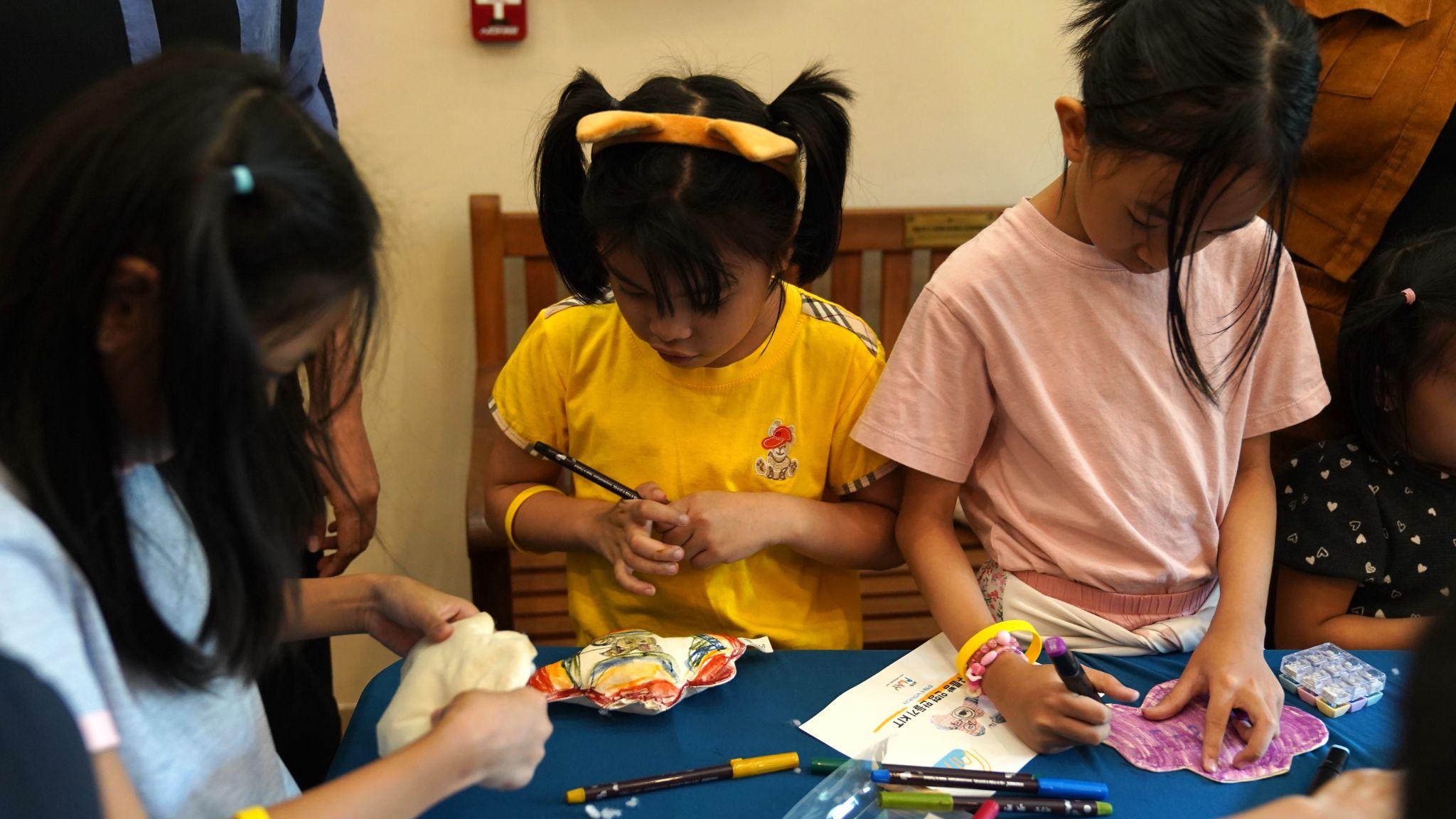 Photo 4.&nbsp;Children create their own stuffed toys inspired by the featured stories.