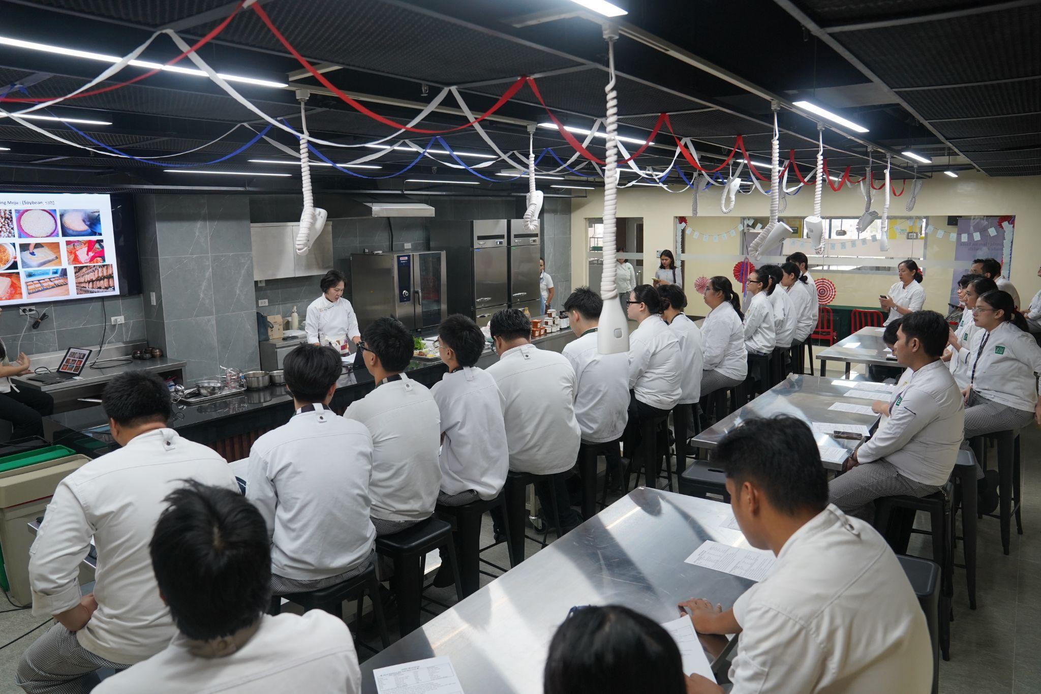 Photo 6.&nbsp;Chef Lily Min explains Korean food culture and the significance of jang.