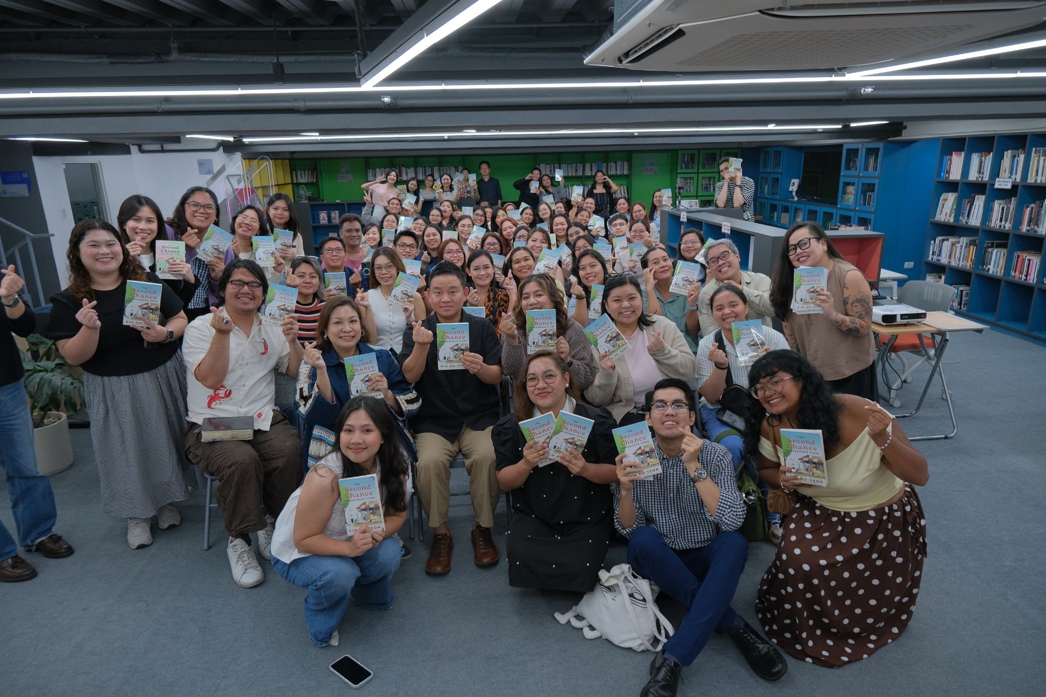 Attendees pose for a group photo after the 3-day “Moments with Kim Ho-yeon: Where Second Chances Begin”